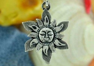 The symbol of the sun is a small charm for good luck. 